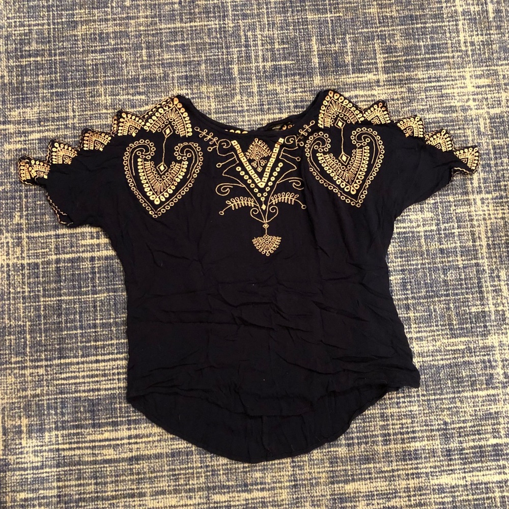 Embroidered navy blue shirt with diamond cut-outs